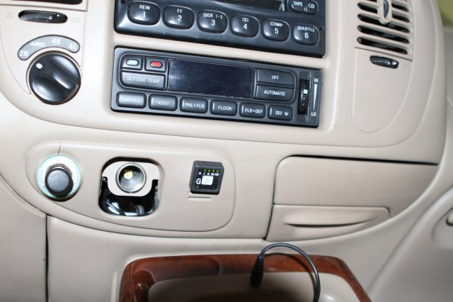 Кнопка переключения и индексации режимов работы ГБО в салоне Lincoln Navigator